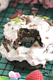 Flourless Chocolate Cake Baked Donuts are puffy and decadent, made with only 3 ingredients, and topped with raspberry coconut whipped cream