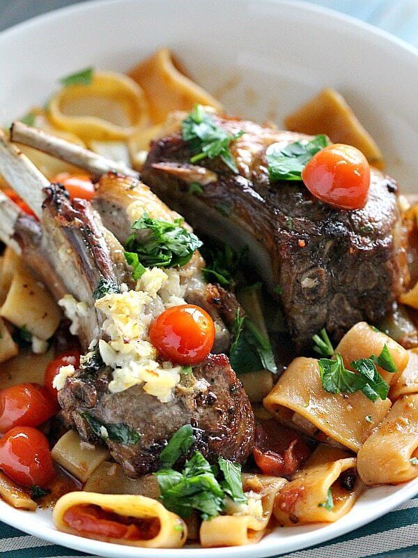 Image of garlic lamb chops over pasta.