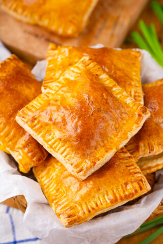 Golden and crispy puff pastry cheese pockets.