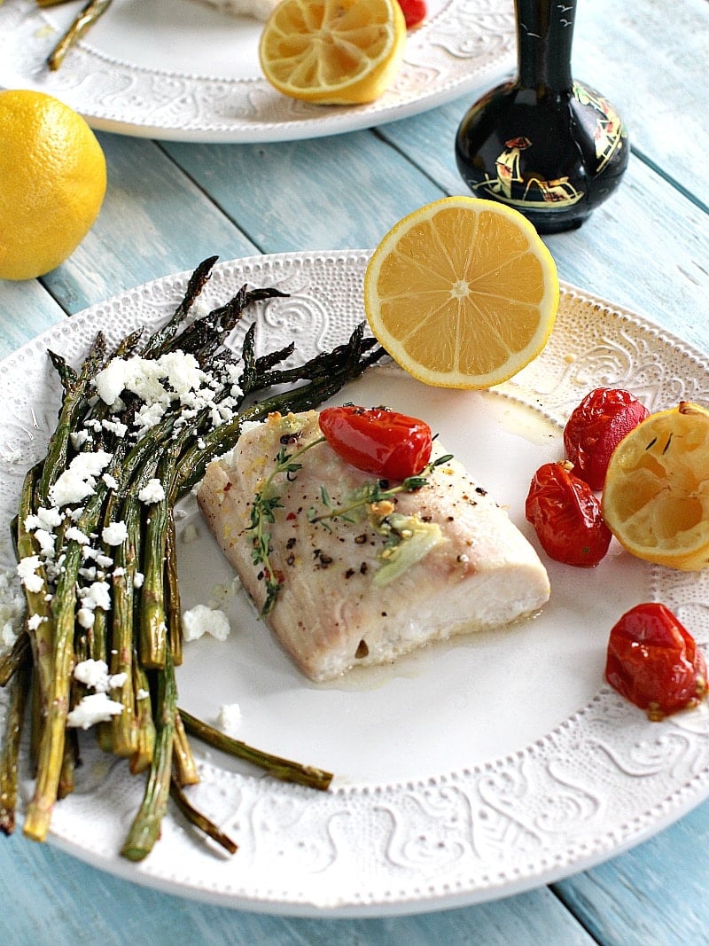 Image of roasted mahi-mahi and asparagus on a white plate.