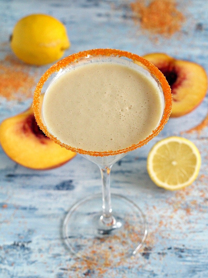 Sweet and festive Peaches and Cream martini made with coconut oil roasted peaches and delicious Godiva white chocolate liqueur.