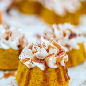 Very easy to make Pumpkin Lava Cakes are stuffed with sweet Dulce de Leche, topped with whipped cream and sprinkled with cinnamon. #pumpkin #lavacakes #dulcedeleche #thanksgiving #sweetandsavorymeals