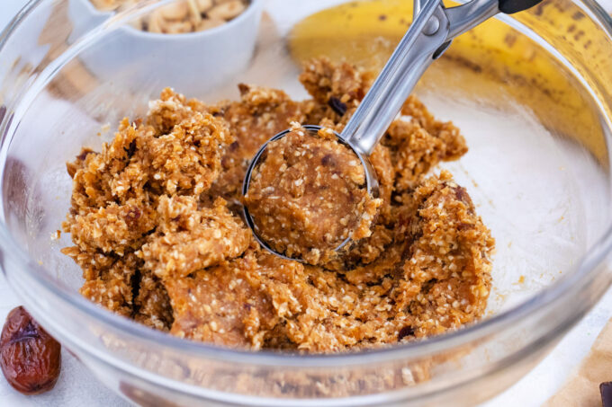 Scooping peanut butter truffles.