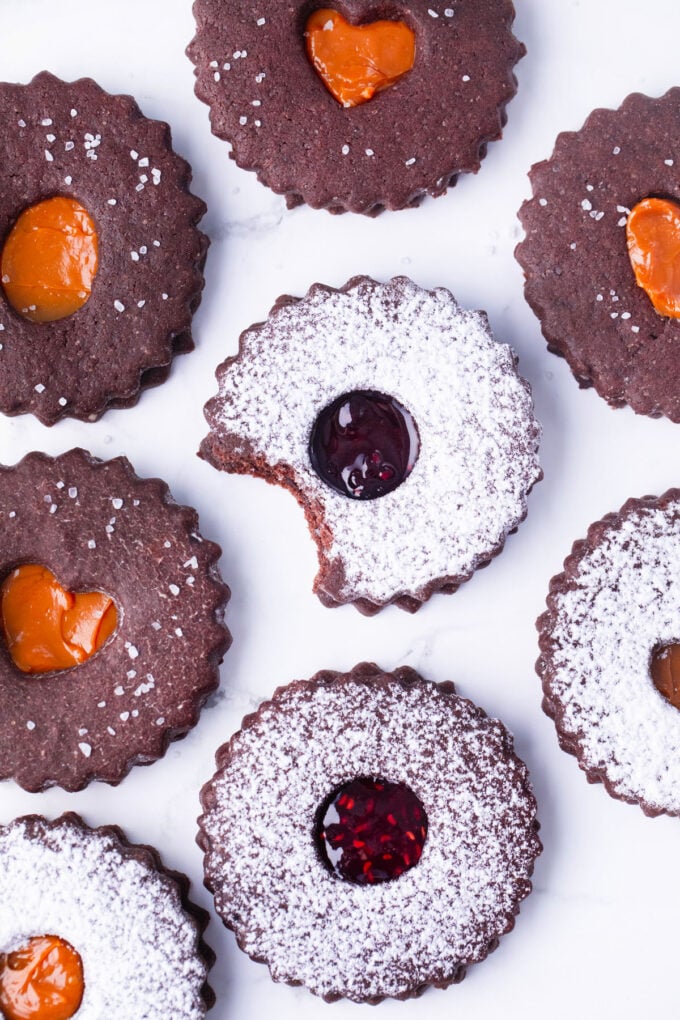 Overhead shot of chocolate Linzer cookies with Dulce de leche.