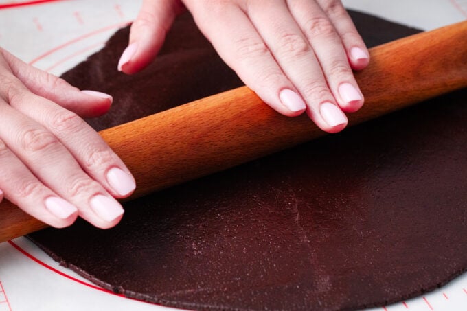 Rolling chocolate cookie dough.