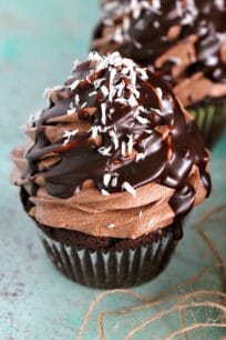 Best German Chocolate Cupcakes recipe,soft and chocolaty cupcakes are stuffed with a coconut-pecan filling and topped with chocolate cream cheese frosting.