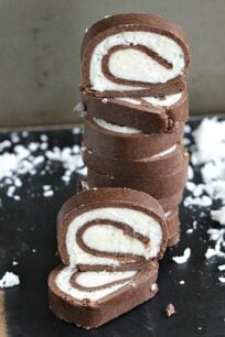 This easy and fun no bake almond joy roll is dense, chocolaty and has a creamy, sweet and smooth coconut filling. A perfect kitchen project for kids and adults.
