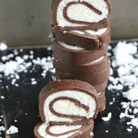 This easy and fun no bake almond joy roll is dense, chocolaty and has a creamy, sweet and smooth coconut filling. A perfect kitchen project for kids and adults.