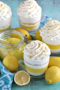 Creamy and easy to make No Bake Lemon Cheesecake layered with graham cracker crumbs, sweet and tangy lemon curd and topped with soft whipped cream.