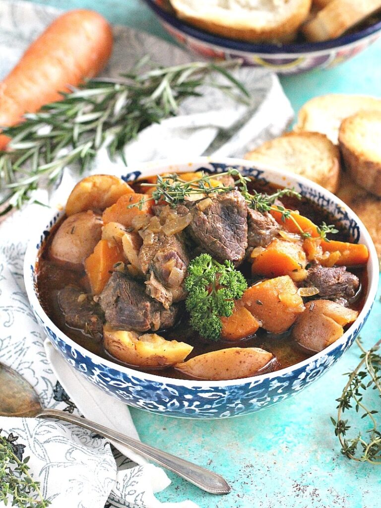 Slow Cooker Beef Stew is incredibly easy to make and filling with tender beef and veggies. Comfort food at it's best made easy in the slow cooker.