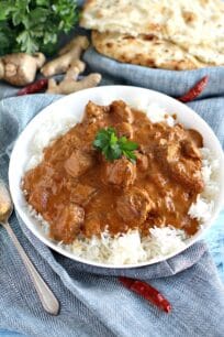 Slow Cooker Chicken Tikka Masala is incredibly easy to make at home, by adding all the ingredients to your slow cooker and let it cook to perfection.