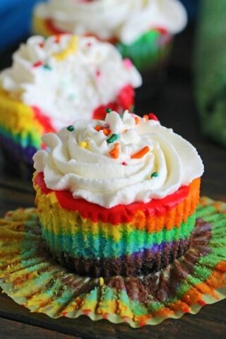 Mini Rainbow Cheesecakes are incredibly easy to make and very festive. They taste delicious and would be a fun project to do with the kids.