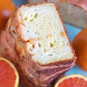Dreamy Orange Pound Cake with Orange Glaze is rich and flavorful, with a beautiful orange scent and a creamy orange flavored cheesecake swirl.