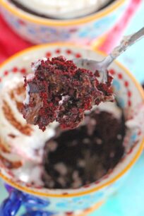 5 minutes, few ingredients and 1 bowl is what you need to make this Nutella Stuffed Red Velvet Mug Cake that has been perfectly portioned for two!