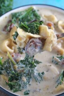 Slow Cooker Tortellini Soup that can be made in the Crockpot or Instant Pot! Creamy, loaded with chicken sausage, veggies, kale and three cheese tortellini.