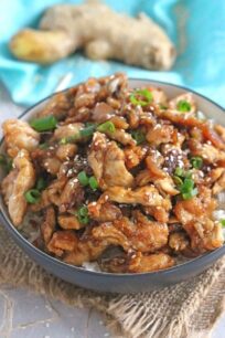 Incredibly Crispy Sesame Chicken with a delicious ginger flavor can be made in less than 30 minutes! Quicker and tastier than take-out!