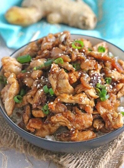 Incredibly Crispy Sesame Chicken with a delicious ginger flavor can be made in less than 30 minutes! Quicker and tastier than take-out!