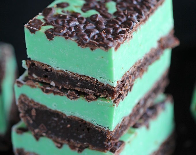 Mint Chocolate Chip Fudge over incredibly fudgy and chocolaty brownies is the best combo ever. Any mint chocolate chip fan will love this easy dessert.