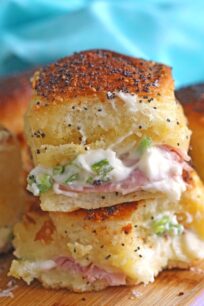 Spicy Ham Sliders are stuffed with fresh jalapeños, lots of cheese and brushed with parmesan garlic butter for the perfect golden finish.