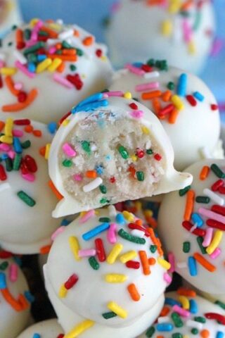 No Bake Cake Batter Truffles are very easy to make using funfetti cake mix. Loaded with lots of sprinkles and dipped in white chocolate, these are delicious.