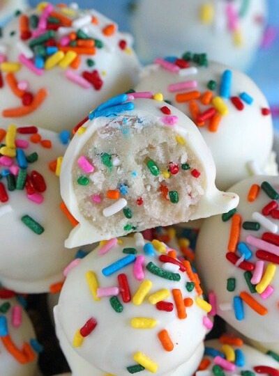 No Bake Cake Batter Truffles are very easy to make using funfetti cake mix. Loaded with lots of sprinkles and dipped in white chocolate, these are delicious.