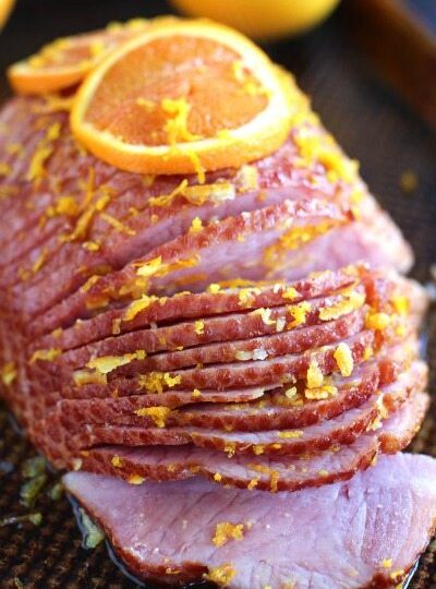 Slow Cooker Brown Sugar Ham with Orange Glaze is an amazingly flavorful and refreshing way to easily cook ham to juicy perfection in your slow cooker.
