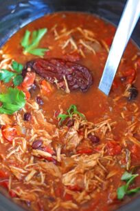 Slow Cooker Tortilla Soup is hearty and spicy, loaded with you favorite fixings, this easy to make meal is the epitome of comfort food.