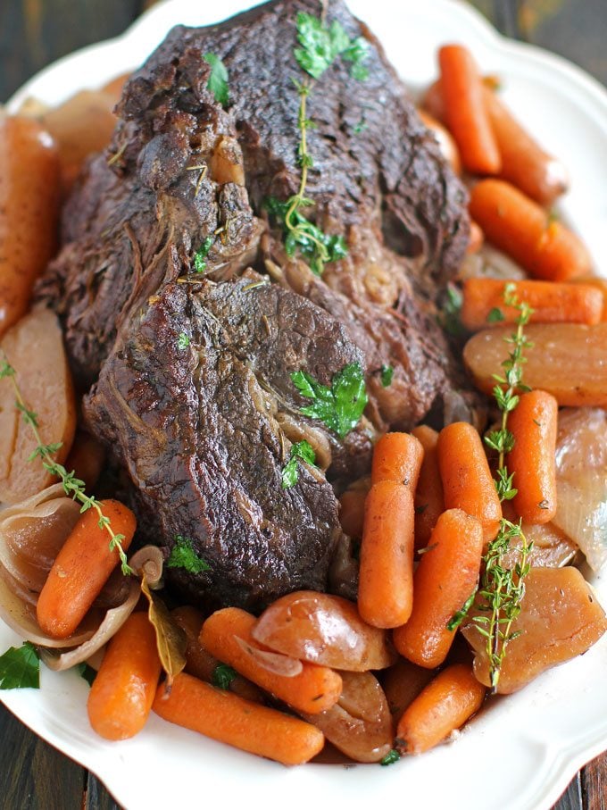 Picture of slow cooker pot roast with carrots and potatoes.