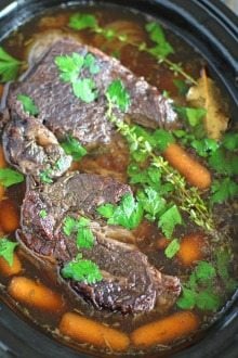 Slow Cooker Pot Roast made with red wine is such an easy and delicious meal, hearty and packed with meat and veggies it is perfect for any occasion.