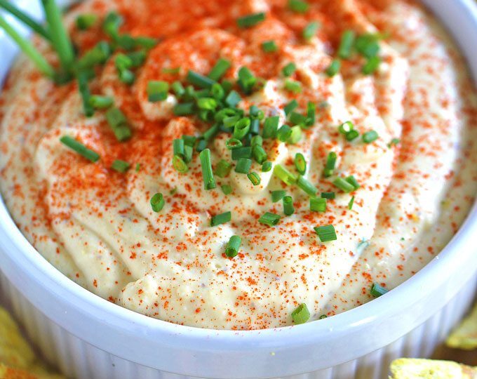 Deviled Eggs Dip made entirely in the food processor. Paprika and chives are great, tasty additions. An easy to make appetizer for a big crowd.