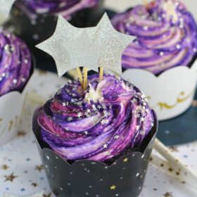 Galaxy Cupcakes are made easy and fun without coloring the buttercream.