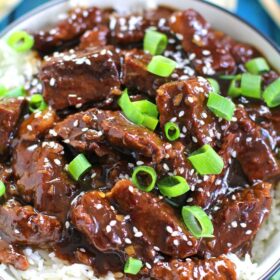 Instant Pot Mongolian Beef ready in 30 minutes! Made with lots of minced garlic and fresh ginger.