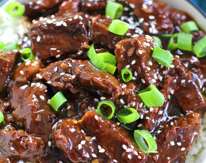 Instant Pot Mongolian Beef ready in 30 minutes! Made with lots of minced garlic and fresh ginger.