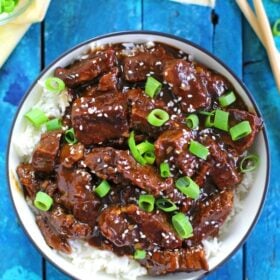 Instant Pot Mongolian Beef ready in 30 minutes! Made with lots of minced garlic and fresh ginger.