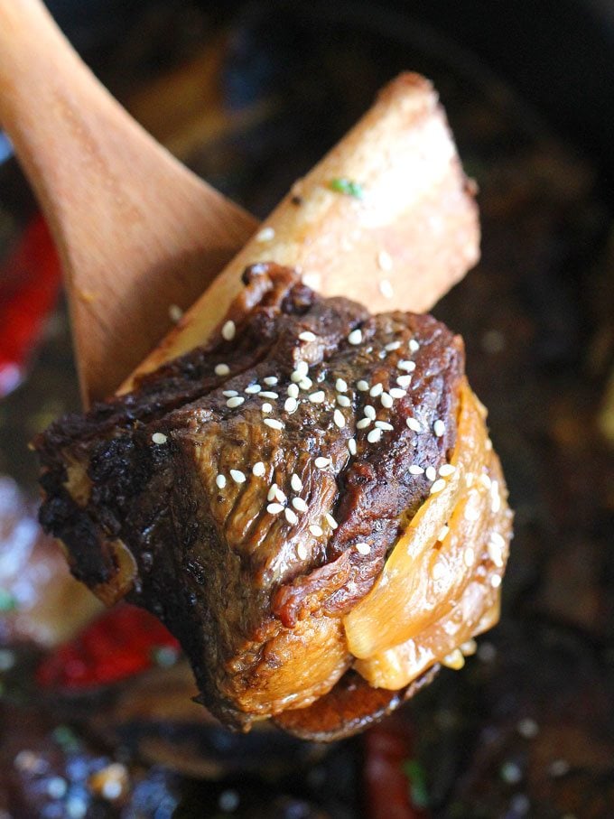 Slow Cooker Asian Short Ribs topped with sesame seeds