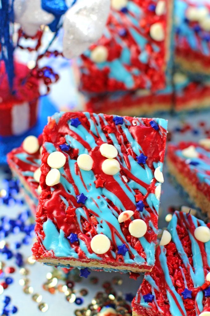Red White and Blue Rice Krispy Treats are fluffy, sweet and very easy to make. Colored in red, white and blue to look extra festive and fun.