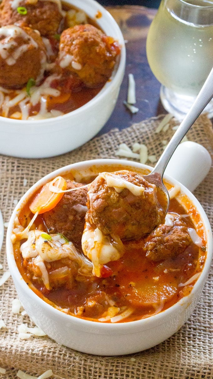 a spoon with a meatball from Instant Pot Italian Meatball Soup