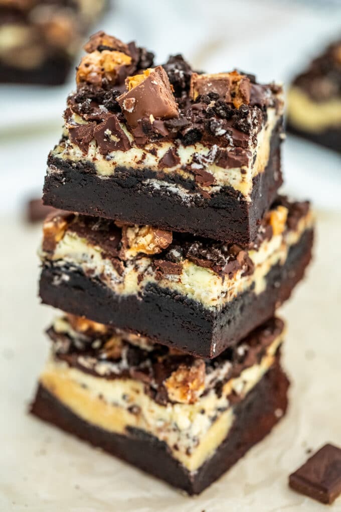 Image of slutty cheesecake brownie bars. 