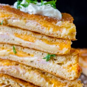 Turkey Grilled Cheese made easy to cook in a large batch using crescent dough sheets. Delicious and fit to feed a crowd with minimum effort!