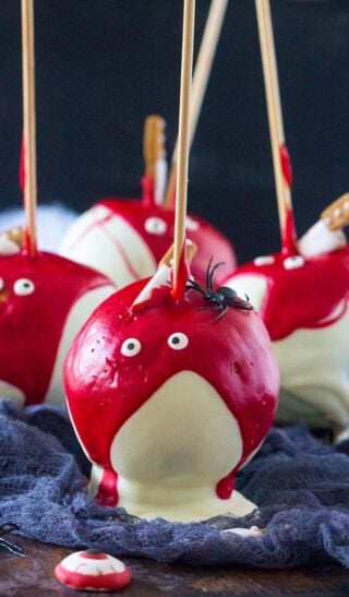 Bloody Halloween Desserts like these Chocolate Dipped Apples, are a fun and easy way to take your Halloween treats to a new scary, delicious and fun level!