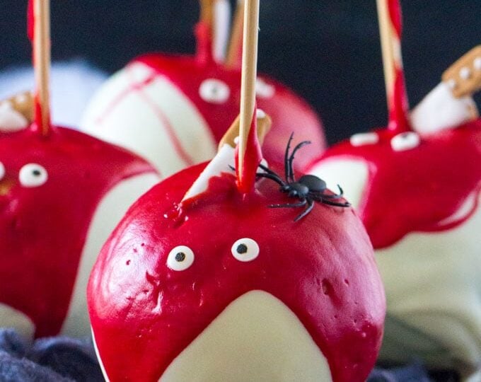 Bloody Halloween Desserts like these Chocolate Dipped Apples, are a fun and easy way to take your Halloween treats to a new scary, delicious and fun level!