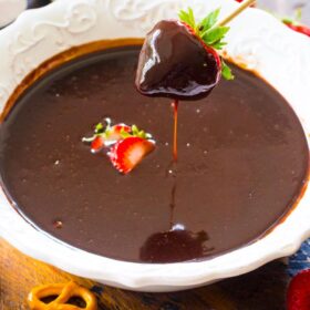 Slow Cooker Chocolate Fondue is rich, smooth and luxurious. Easy to make in the slow cooker and serve with your favorite dippers.