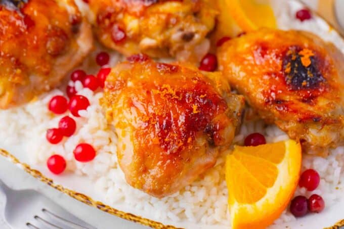 crispy baked cranberry orange chicken served on top of rice