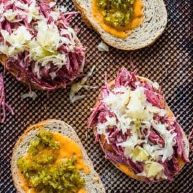 Homemade Corned Beef Sandwiches are the homemade take on the classic deli sandwiches of corned beef with toasted rye bread, sauerkraut and Russian dressing.