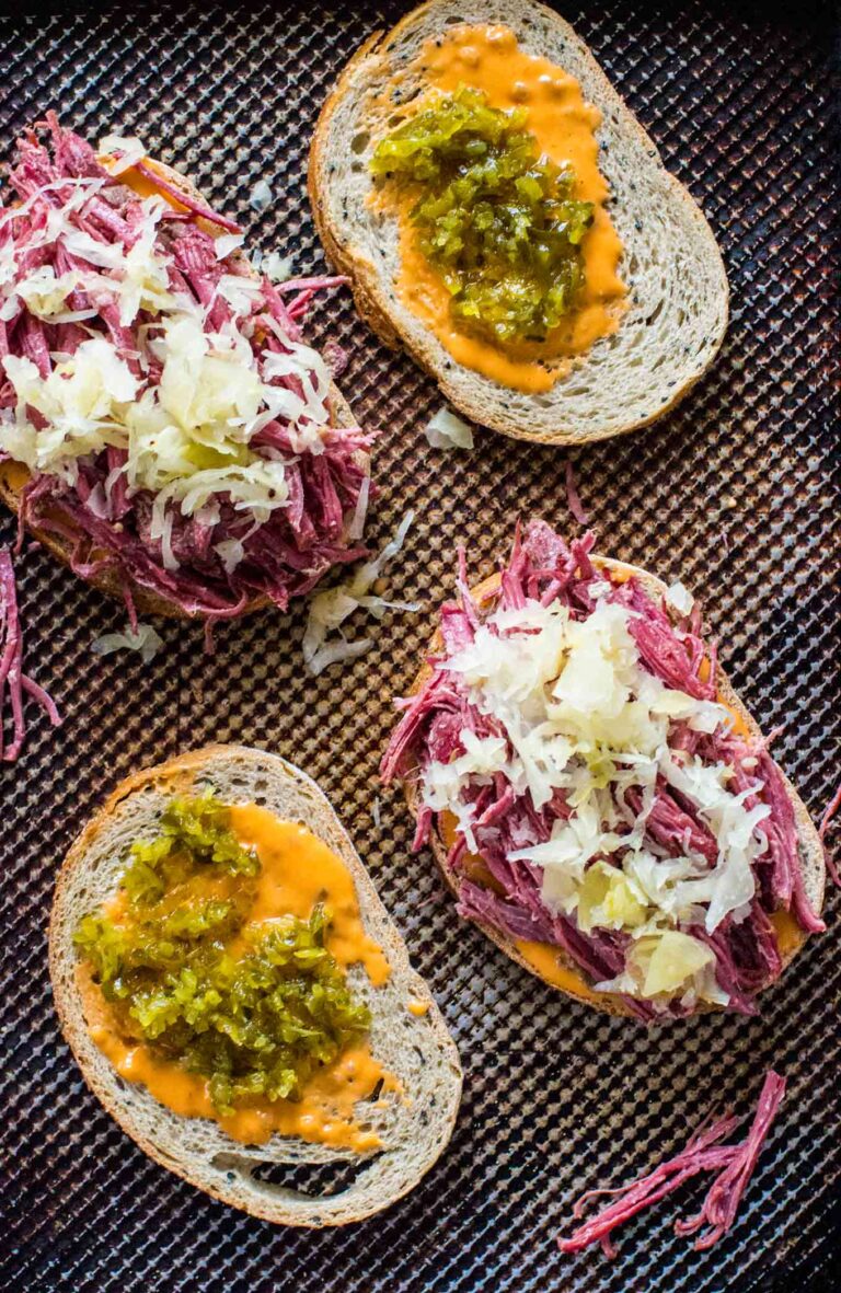 Homemade Corned Beef Sandwiches are the homemade take on the classic deli sandwiches of corned beef with toasted rye bread, sauerkraut and Russian dressing.