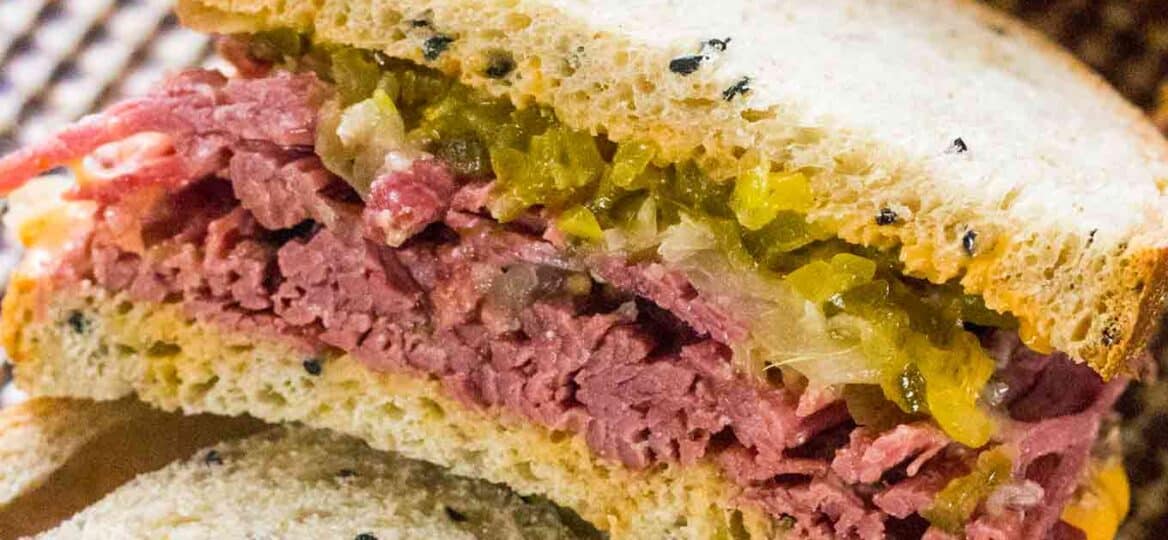 The real deal Corned Beef Sandwiches are the homemade take on the classic deli sandwiches of corned beef with toasted rye bread, sauerkraut and Russian dressing.