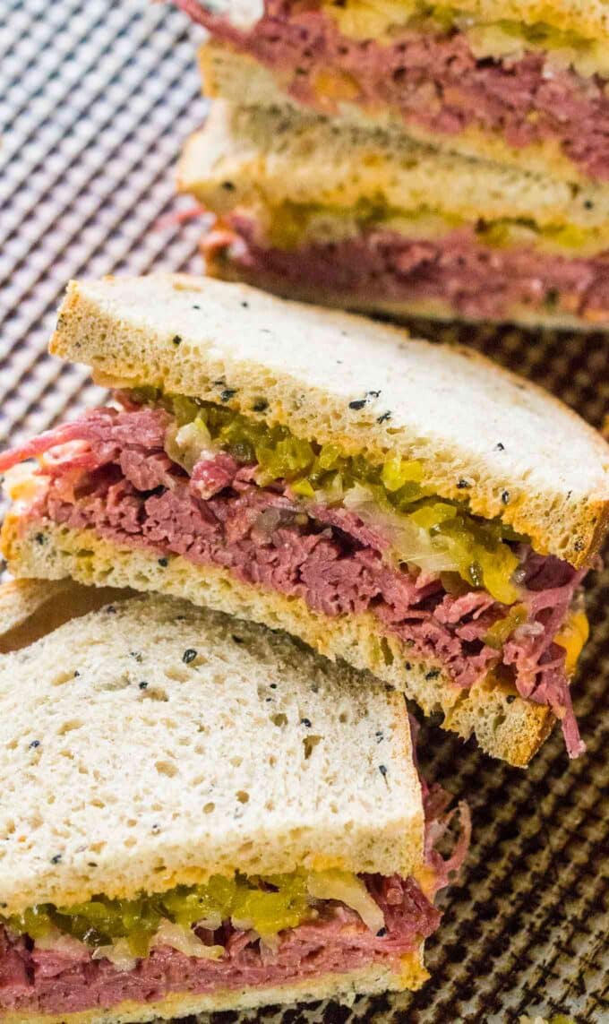 The real deal Corned Beef Sandwiches are the homemade take on the classic deli sandwiches of corned beef with toasted rye bread, sauerkraut and Russian dressing.