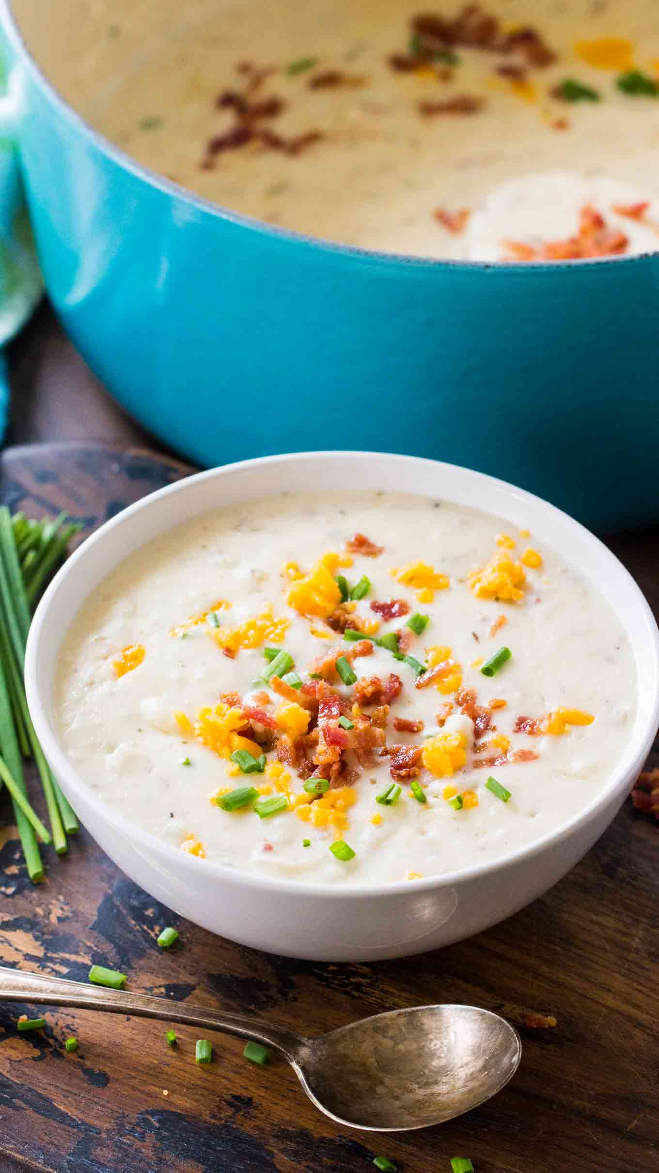 Panera Bread Soups Copycat recipe for their Panera Bread Baked Potato Soup. The famous chain's comforting soup made easy at home. Serve topped with bacon, chives, cheddar cheese and sour cream.