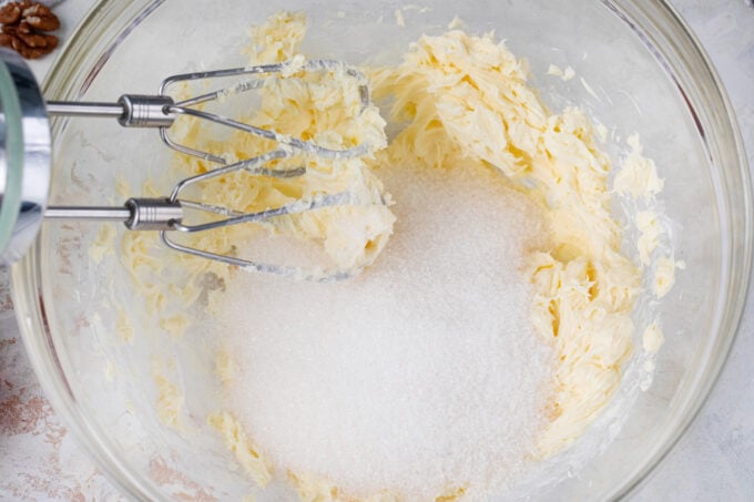 Whipping butter and sugar.