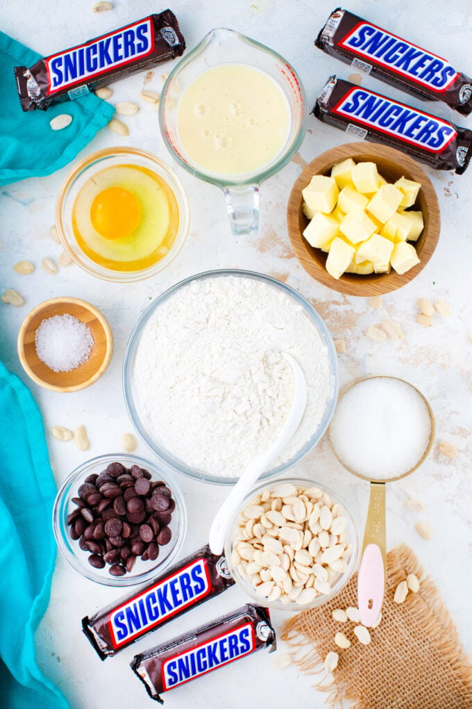 Overhead shot of Snickers cookie bars recipe ingredients.
